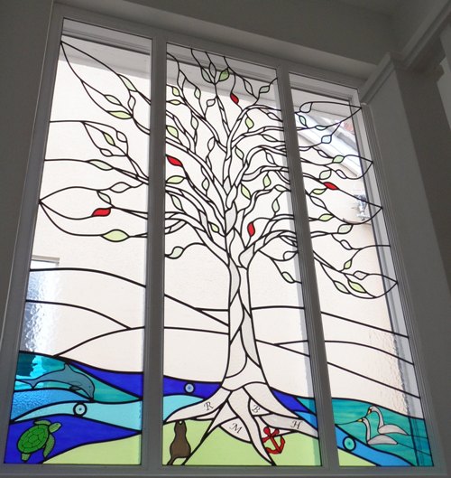 Stained glass tree and seascape